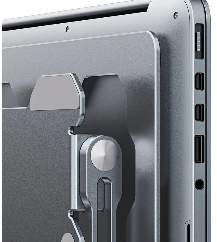 Aluminum adjustable and foldable laptop stand in grey on a desk.