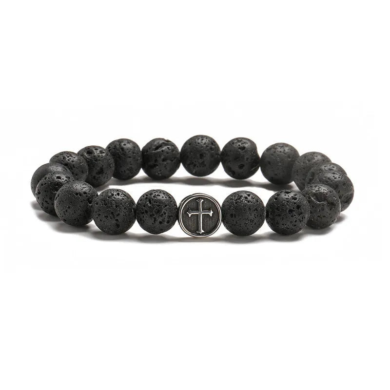 Close-up of a geometric cut volcanic agate bracelet with stainless steel finish, showing 10mm beads.