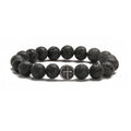 Close-up of a geometric cut volcanic agate bracelet with stainless steel finish, showing 10mm beads.