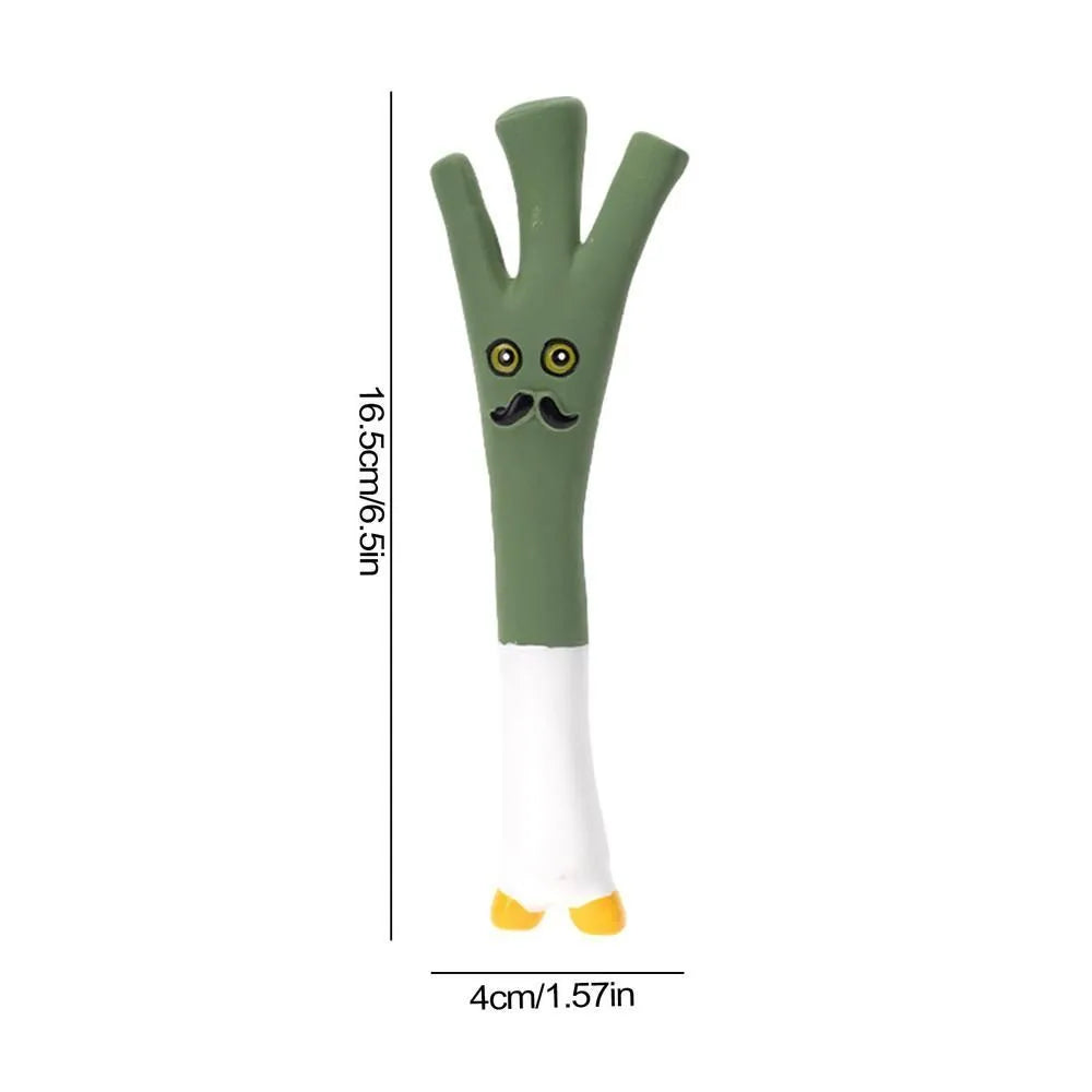 Green cartoon onion-shaped latex dog chew toy on white background