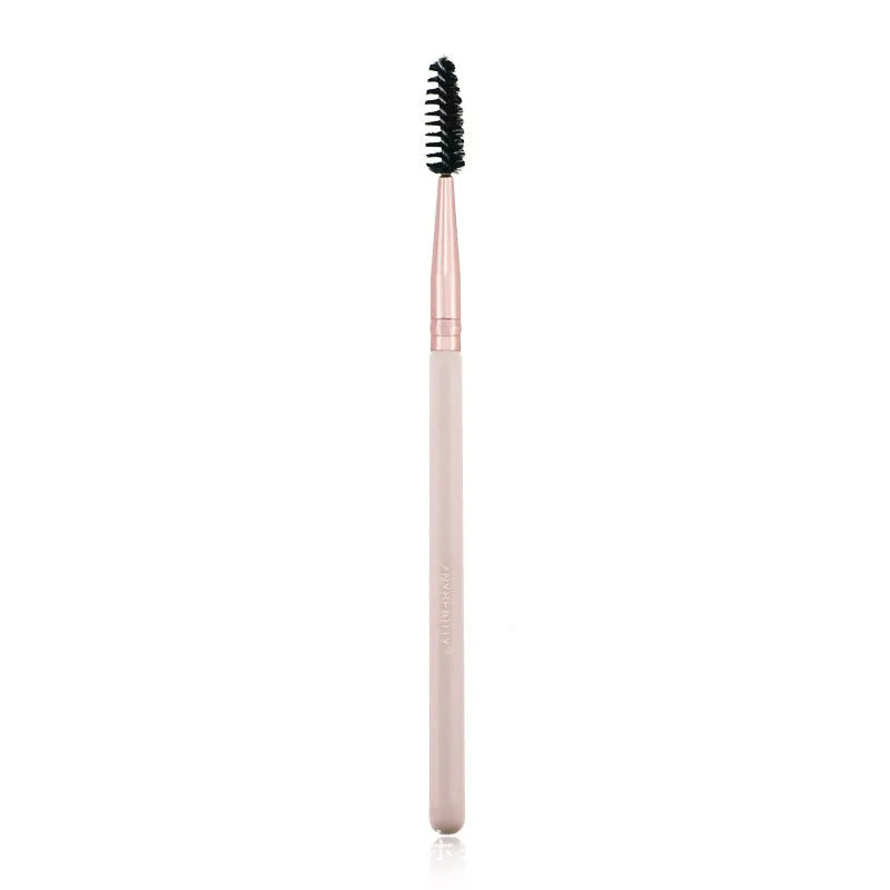 26 pink makeup brushes with wooden handles displayed in a open pink PU travel case