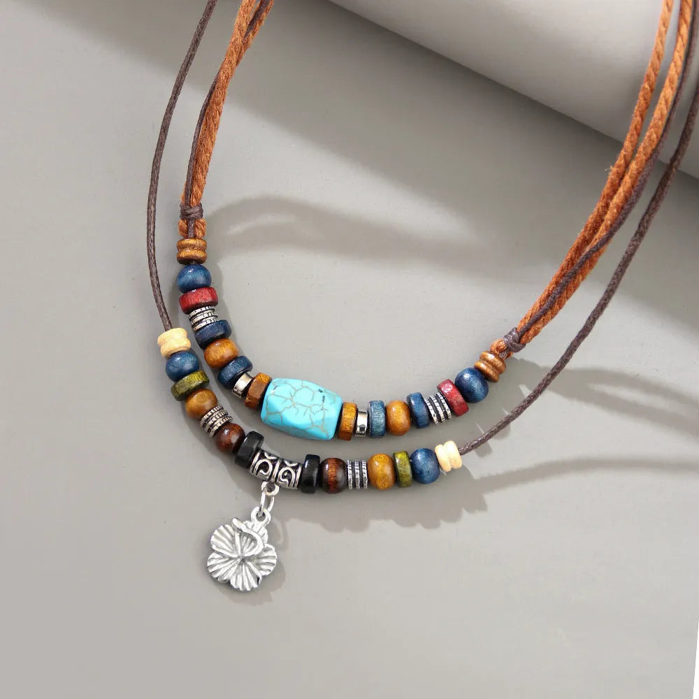 Men's classic wooden bead necklace with turquoise wax rope and alloy geometric flower pendant
