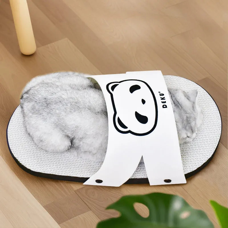 White corrugated cardboard cat scratch board shaped like a slipper on a plain background.