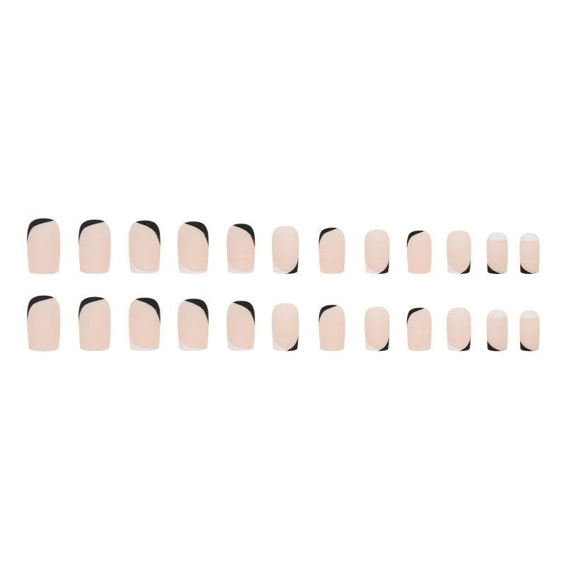 Black and white frosted French style false nails with mandarin duck colour contrast on plastic wearable armour.