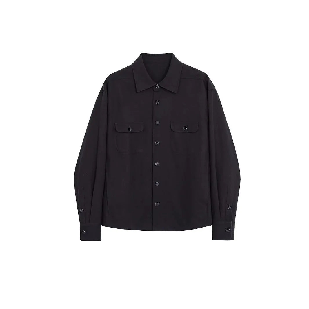 Men's light sand rice coloured cotton shirt with lapel collar and long sleeves laid flat.