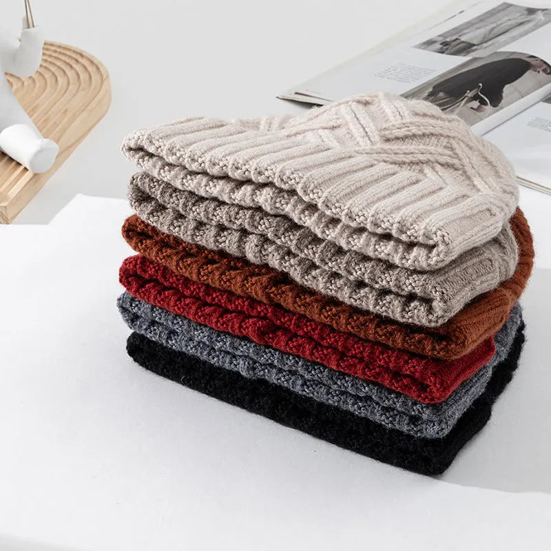 Women's wool knitted dome crown hat with totem pattern in seasonal colours