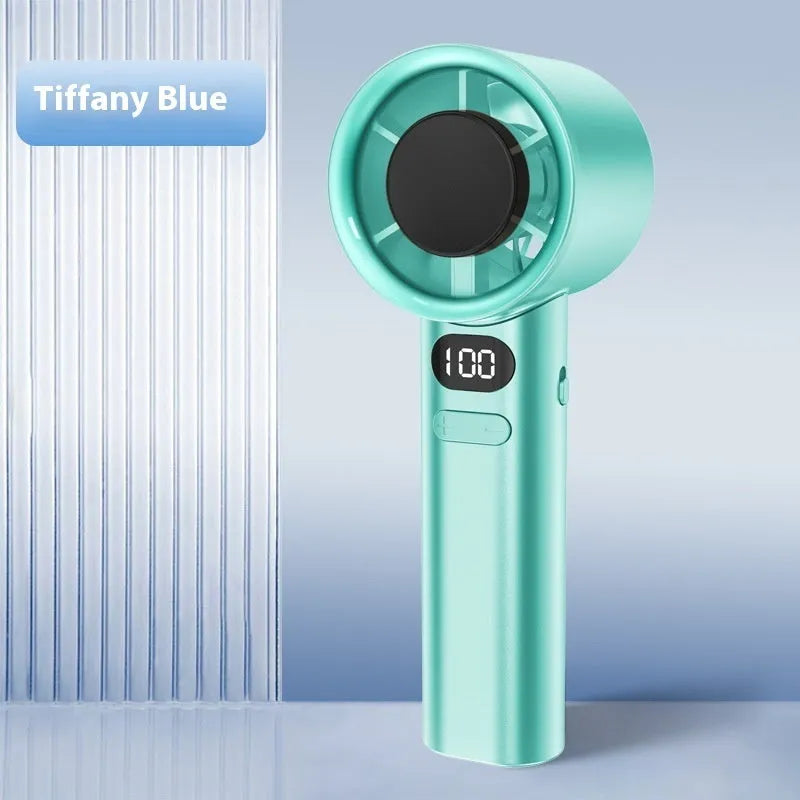 Green handheld USB fan showing variable speed control dial and six plastic blades