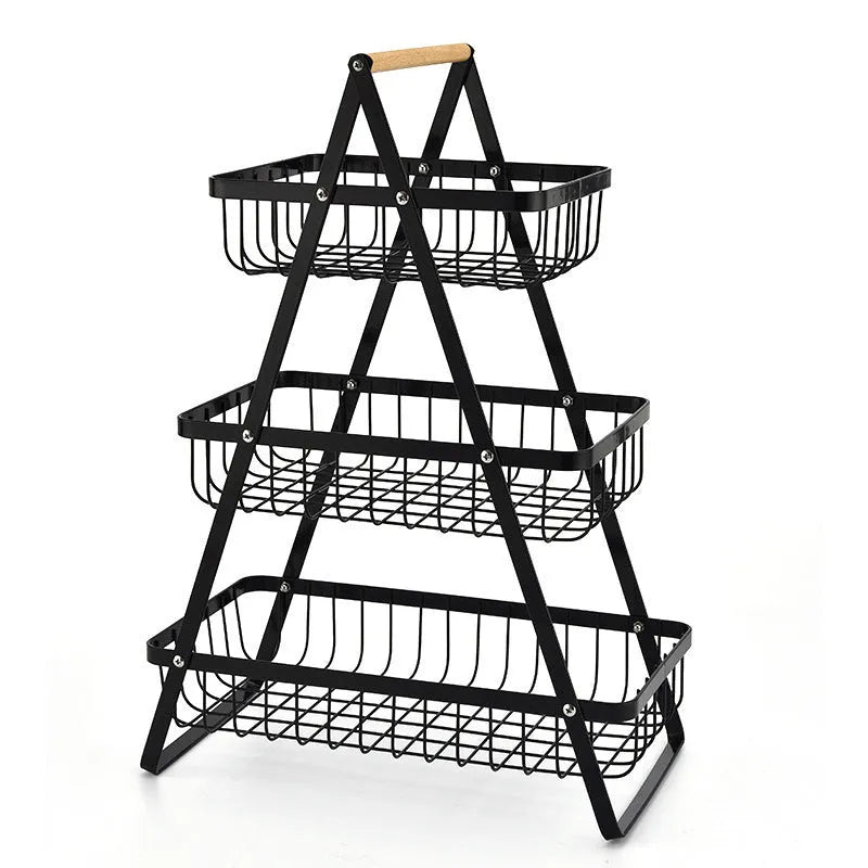 Detachable iron double-layer fruit basket with wooden handle on a kitchen table, black finish
