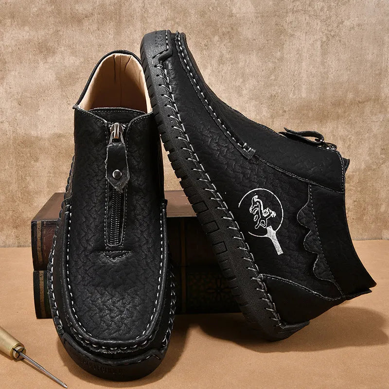 Men's black slip-on leather loafers with round toe and rubber sole