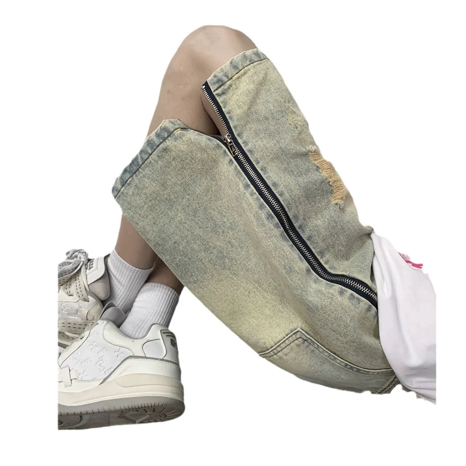 Men's loose five-point denim shorts in blue with ripped yellow-mud effect, straight leg, button fly, front view