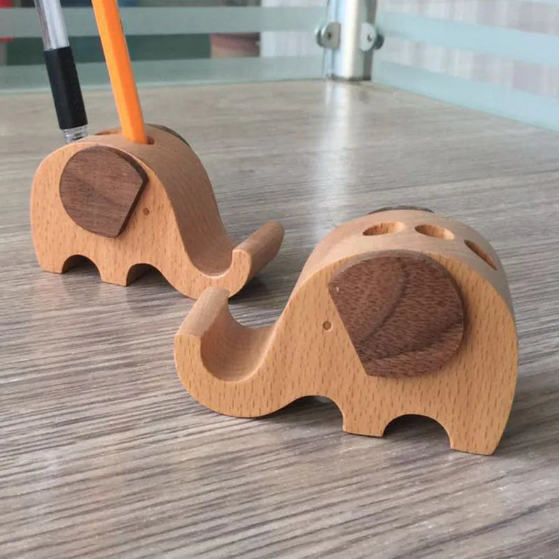 Beech wood mobile phone holder with resin animal design and coin slot