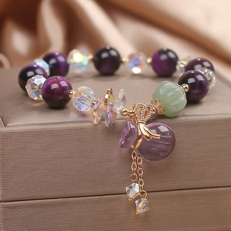 Women's retro transport bracelet with purple tigereye pendant, crystal and rhinestone accents