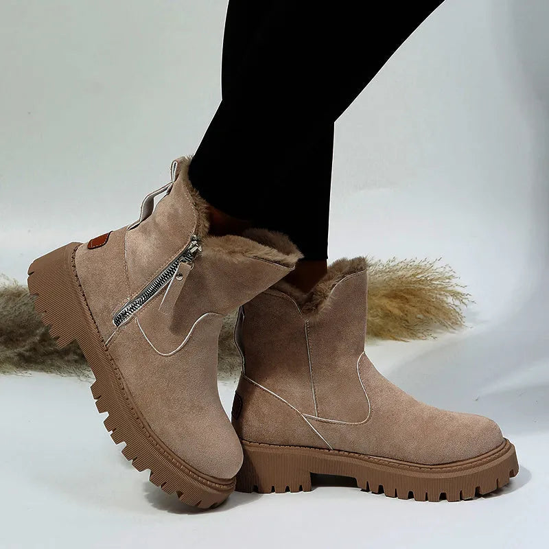 Women's black high-top snow boots with faux suede upper, side zipper, and thick plush lining.