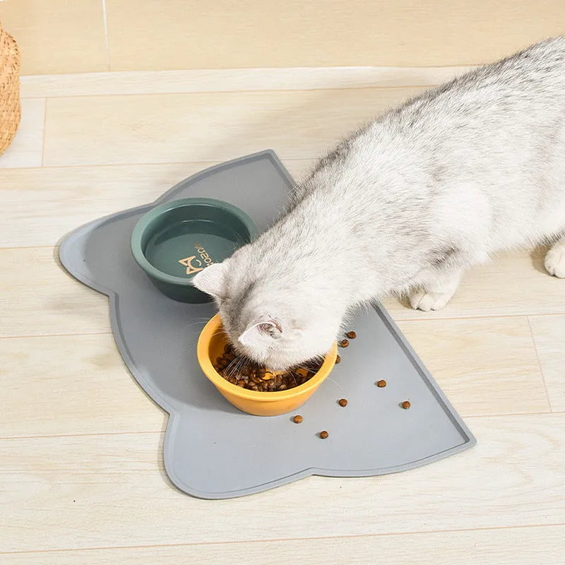 Waterproof silicone pet feeding mat in blue for dog or cat, 44x24cm, with a cat head shape