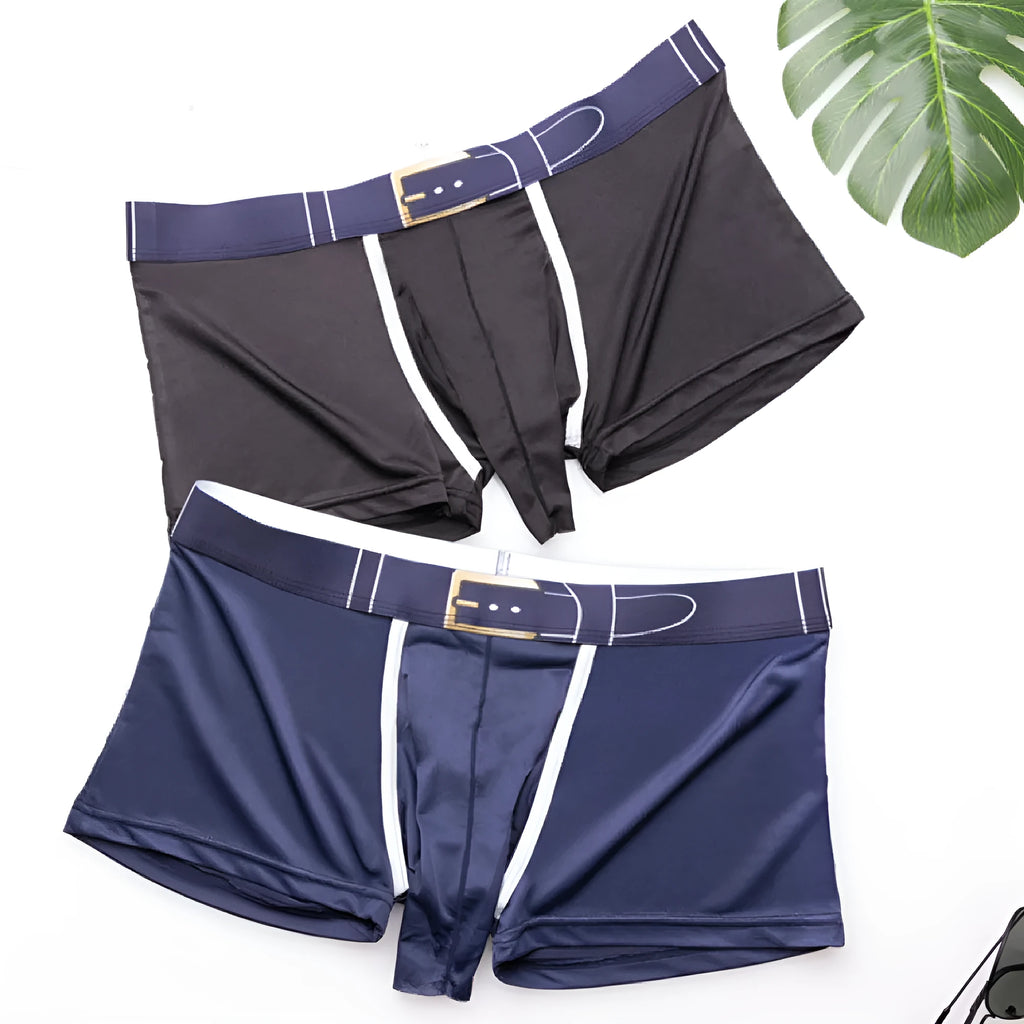 Men's solid colour Ice Silk boxer shorts laid flat, showing mid waist design and fabric texture.