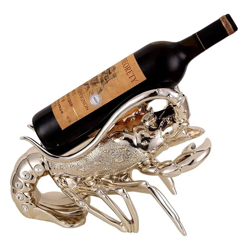 Lobster-shaped wine rack ornament in rose gold metallic finish displaying wine bottle