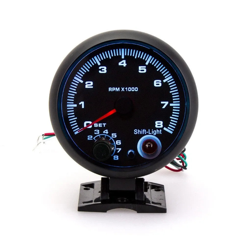 Black automotive tachometer with blue-lit pointer display measuring 95mm