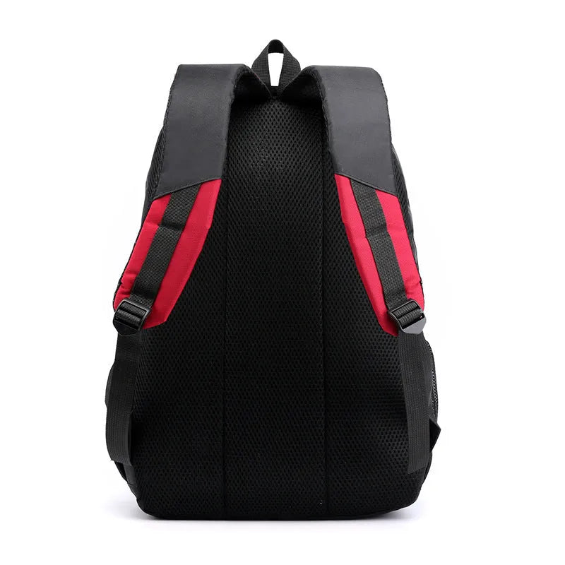 Waterproof nylon school backpack with airpillow straps, available in black, red, blue, and gray