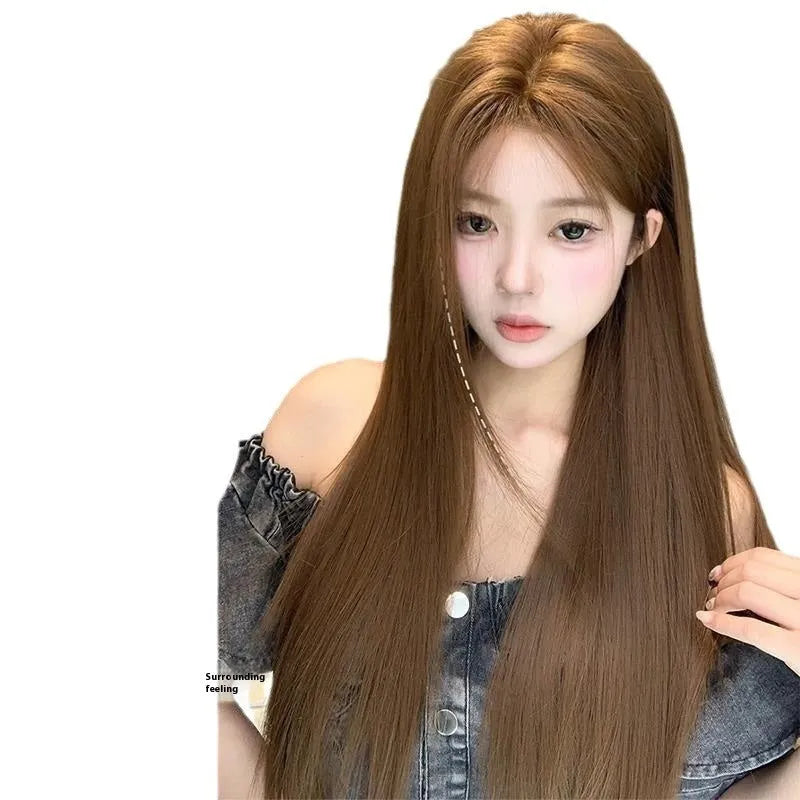 Warm brown lace wig with centre-parted bangs and long straight high-temperature fibre hair on a stand