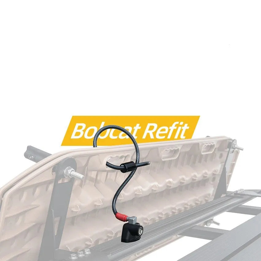 Plastic-sheathed steel cable lock for roof platform securing a ladder, showing no-drill installation.
