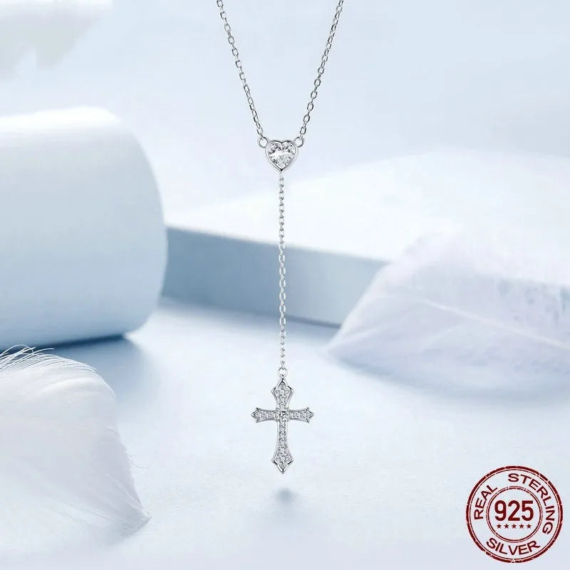 Silver cross necklace with V-neck pendant on an O-ring chain for women