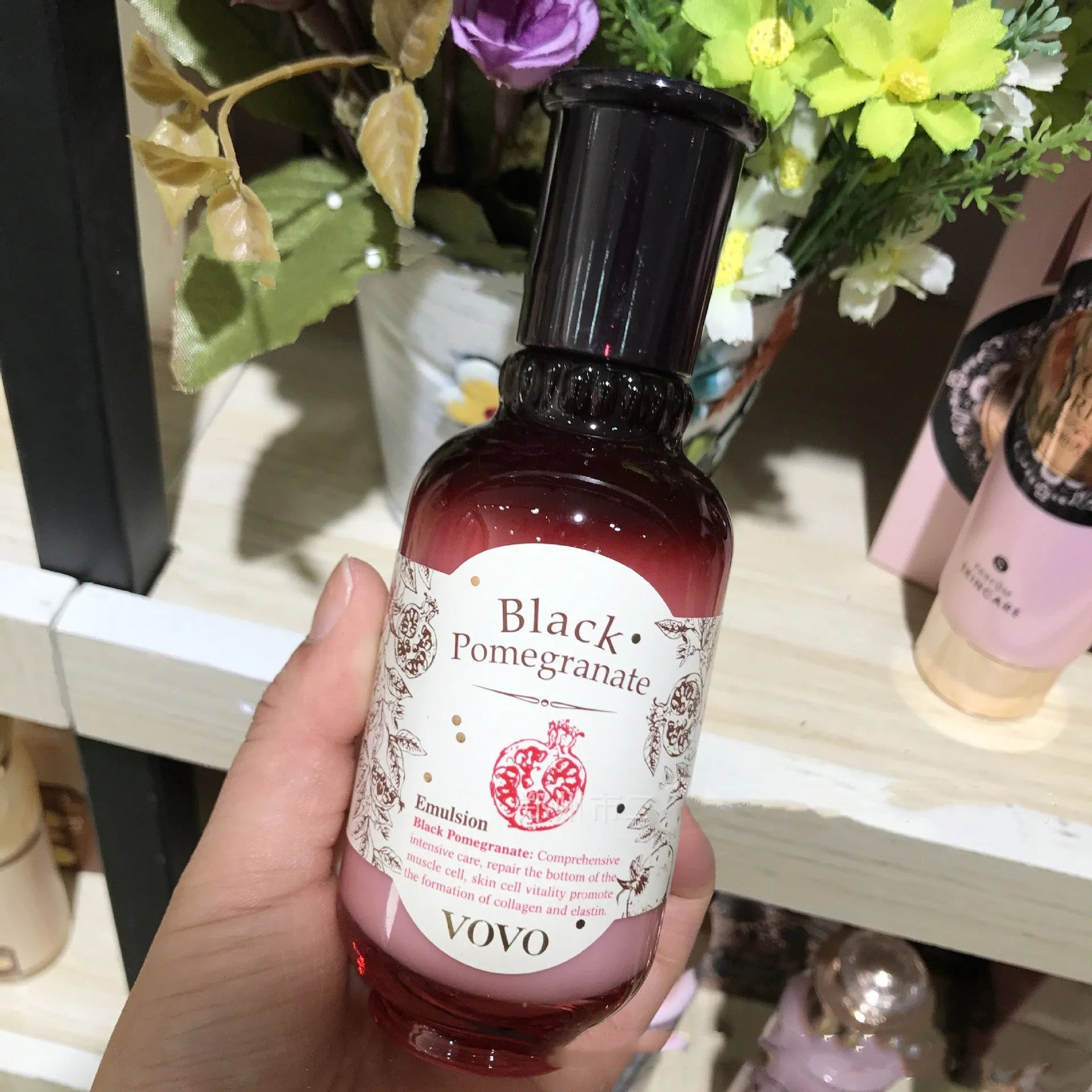 Six-piece pomegranate skincare set including cleanser, toner, lotion, cream, essence and eye cream.