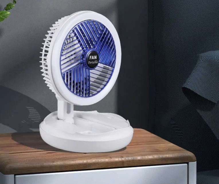 USB charging foldable table fan with LED light in blue, showing 4 speed settings and 300° rotation for home cooling