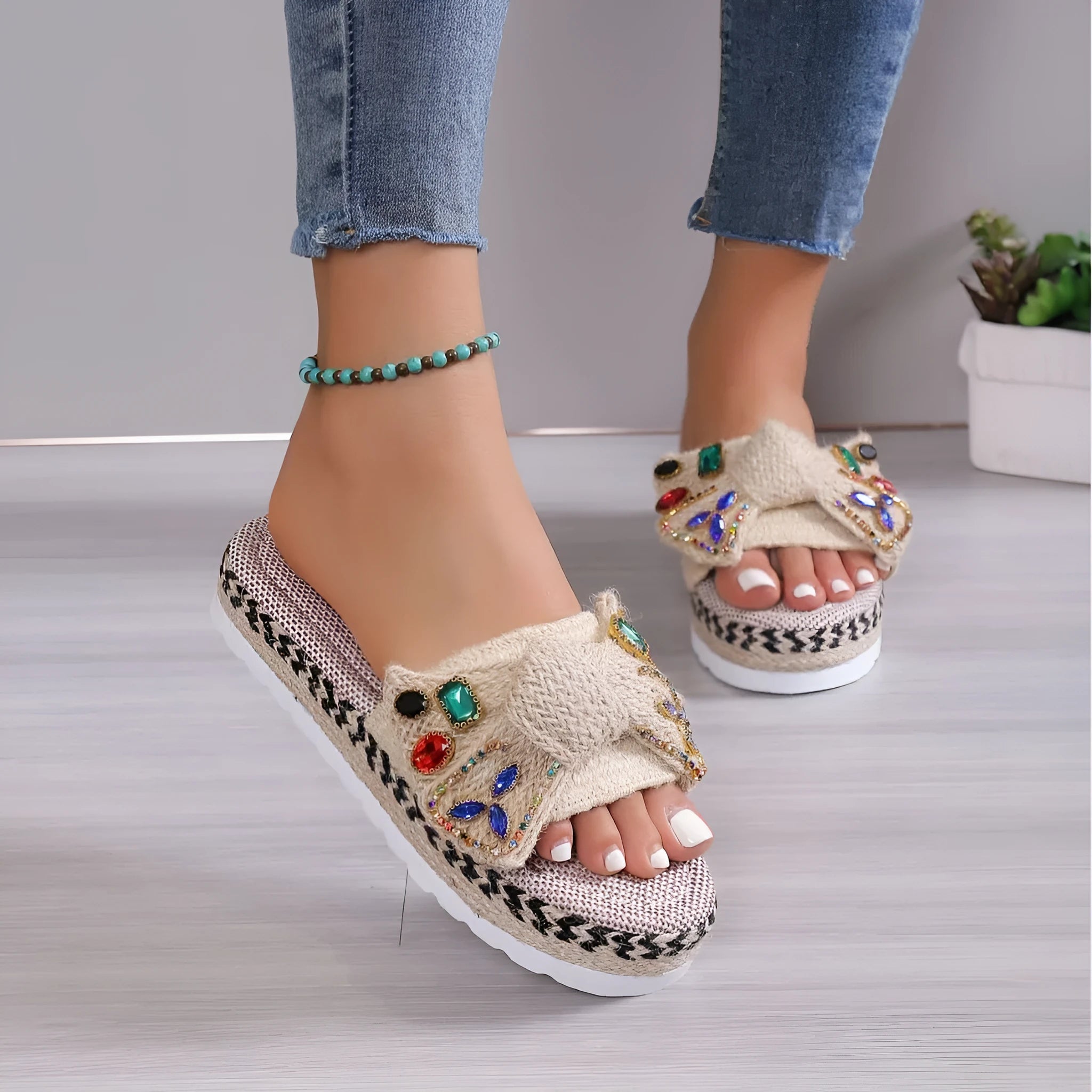 Beige women's platform sandals with bow detail, round toe, and cloth upper