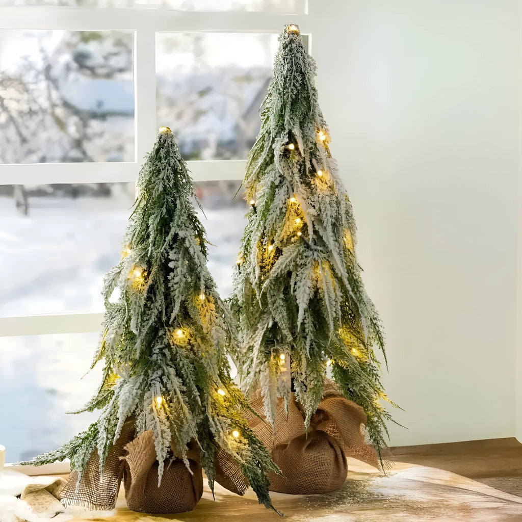 24-inch green PE plastic Christmas tree with lights and snow spray decoration on desktop