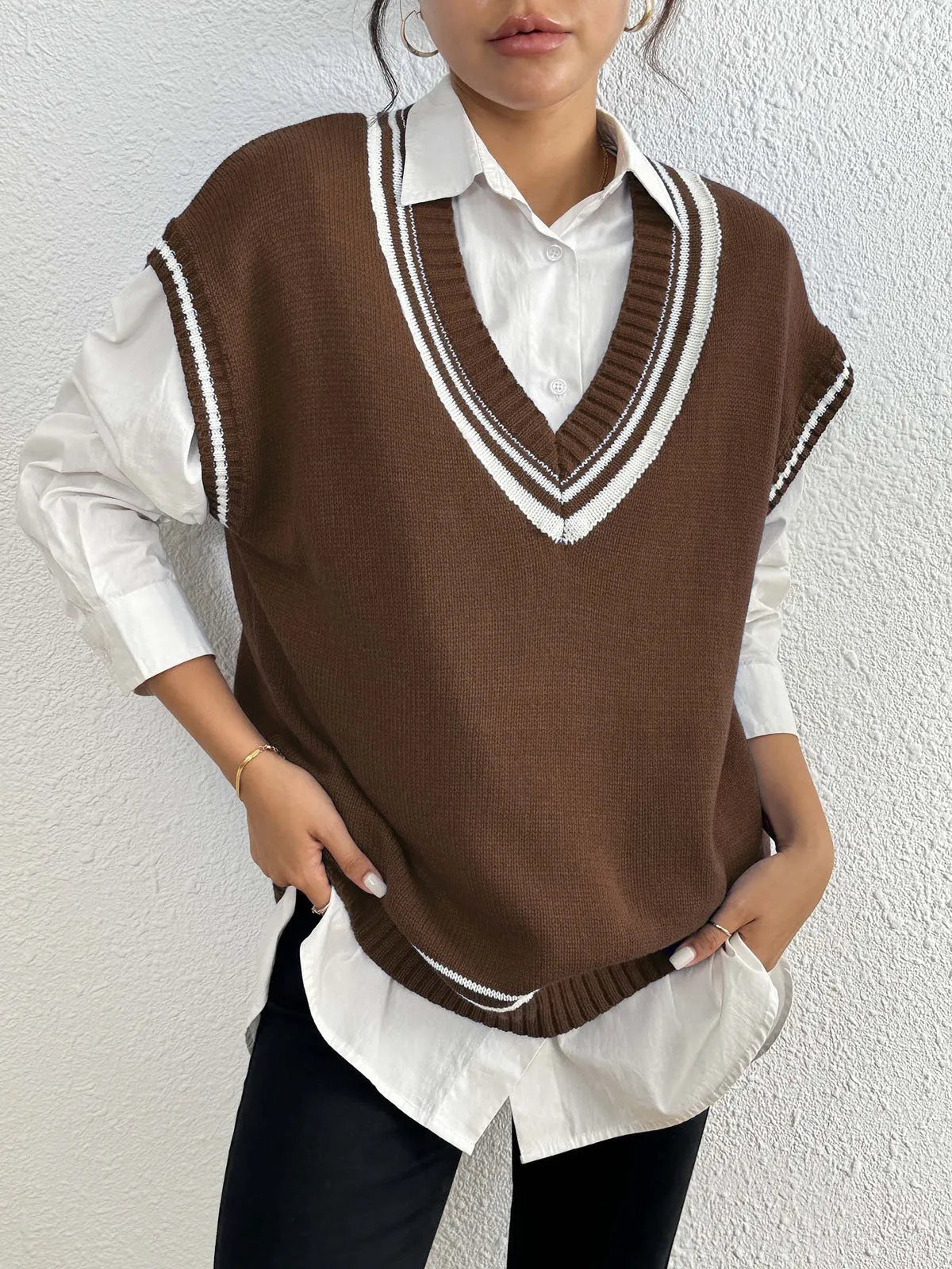 Women's loose college style pullover vest sweater in blue, black, or coffee.