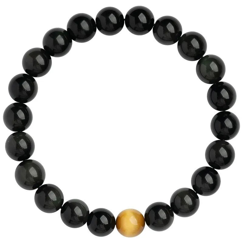 Natural black obsidian bracelet with geometric beads in 10mm size on neutral background