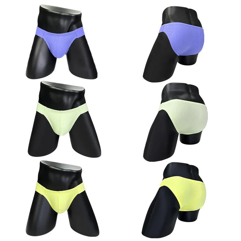 Polyester national triangle low waist seamless briefs in six colours – black, white, pink, purple, green, yellow – on white background