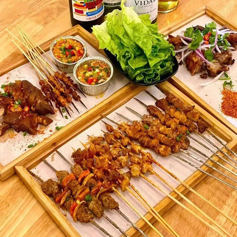 Brown-handled bamboo barbecue serving tray with square shape and solid colour design