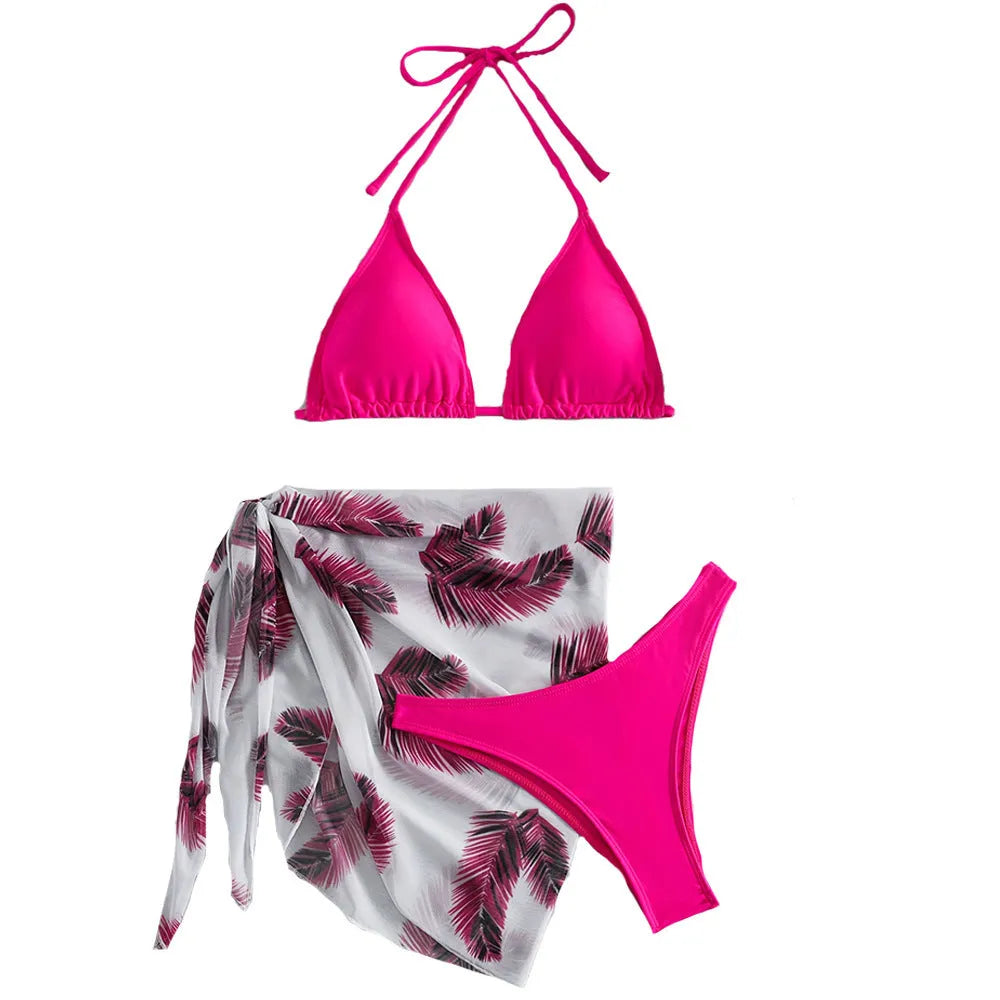 Three-piece bikini swimsuit set with printed gauze skirt in solid colour polyester, available in eight colours sizes XS to XL