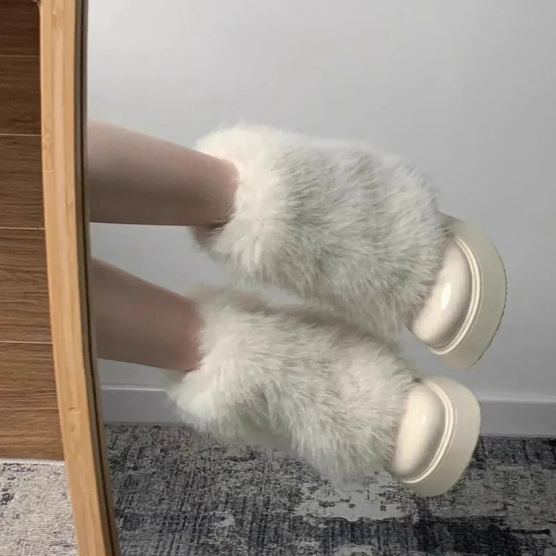 Women's low-top snow boots with artificial plush uppers, waterproof rubber soles, available in black and white colours
