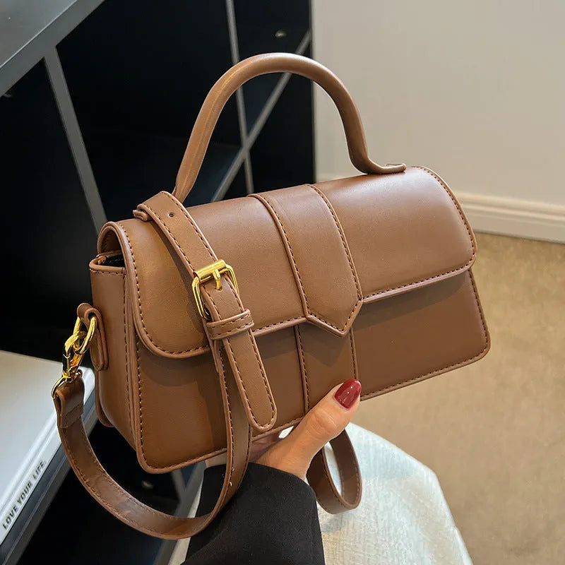 Women's PU leather messenger bag with horizontal square design measuring 22cm wide