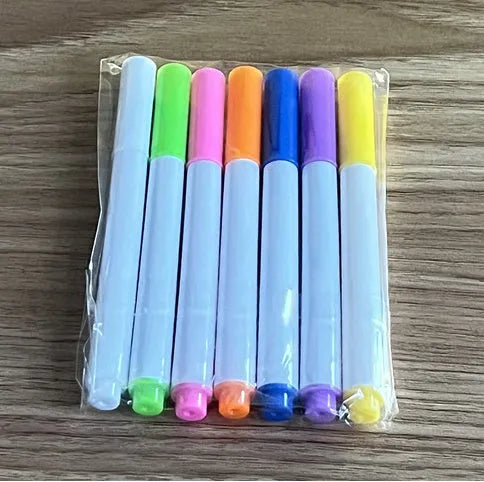 Acrylic DIY note board LED night light with pens on desk, showing written message and soft glow