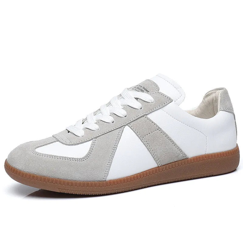 White Japanese-style retro unisex board shoes with mesh upper, rubber sole, and contrast stitching