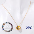 Natural stone beaded necklace set with matching bracelet on display, showing bead detail.