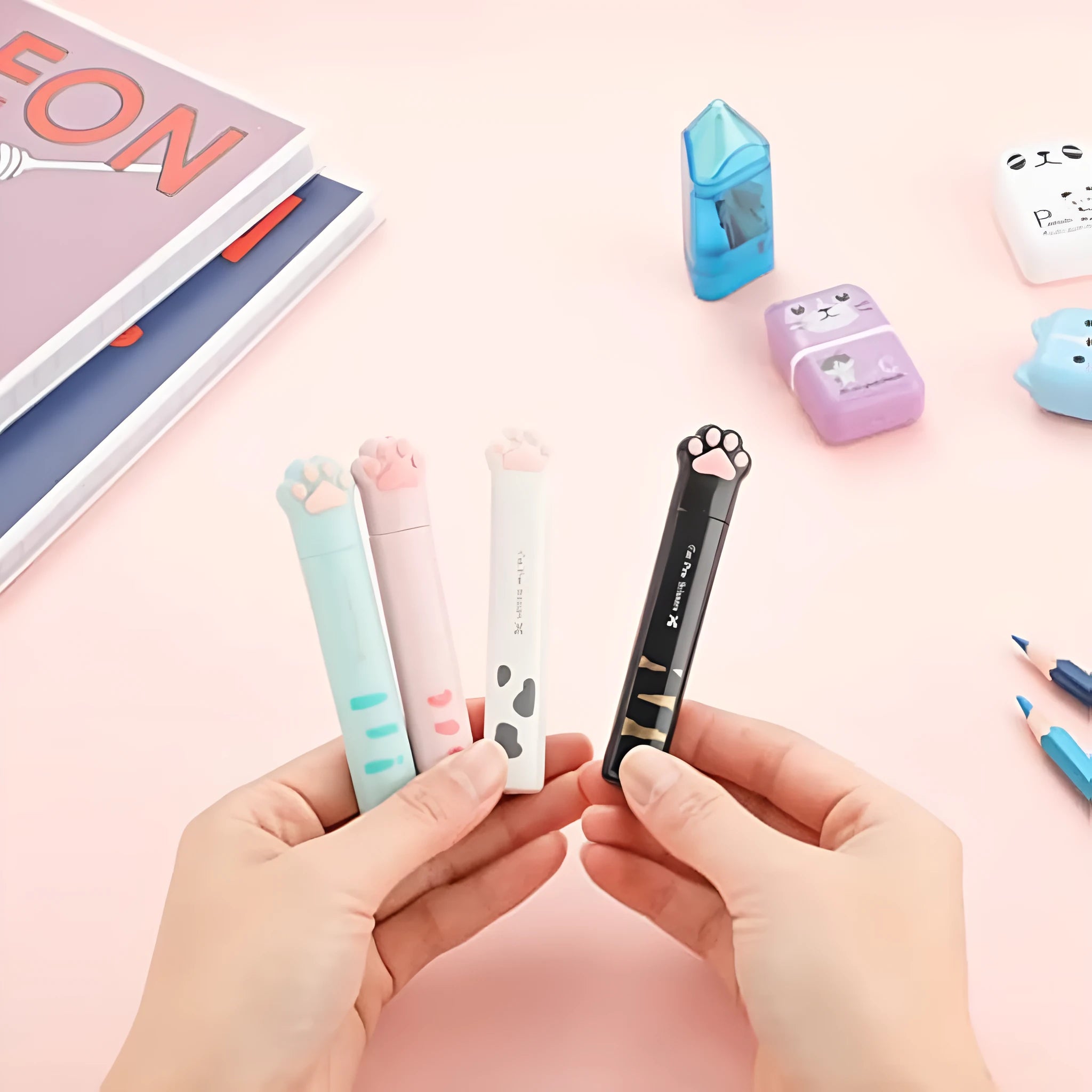 Cat paw mini folding safety scissors showing folded position with stainless steel blades and decorative handle
