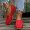 Women's flat loafers in PU leather with car suture detail on a rubber sole