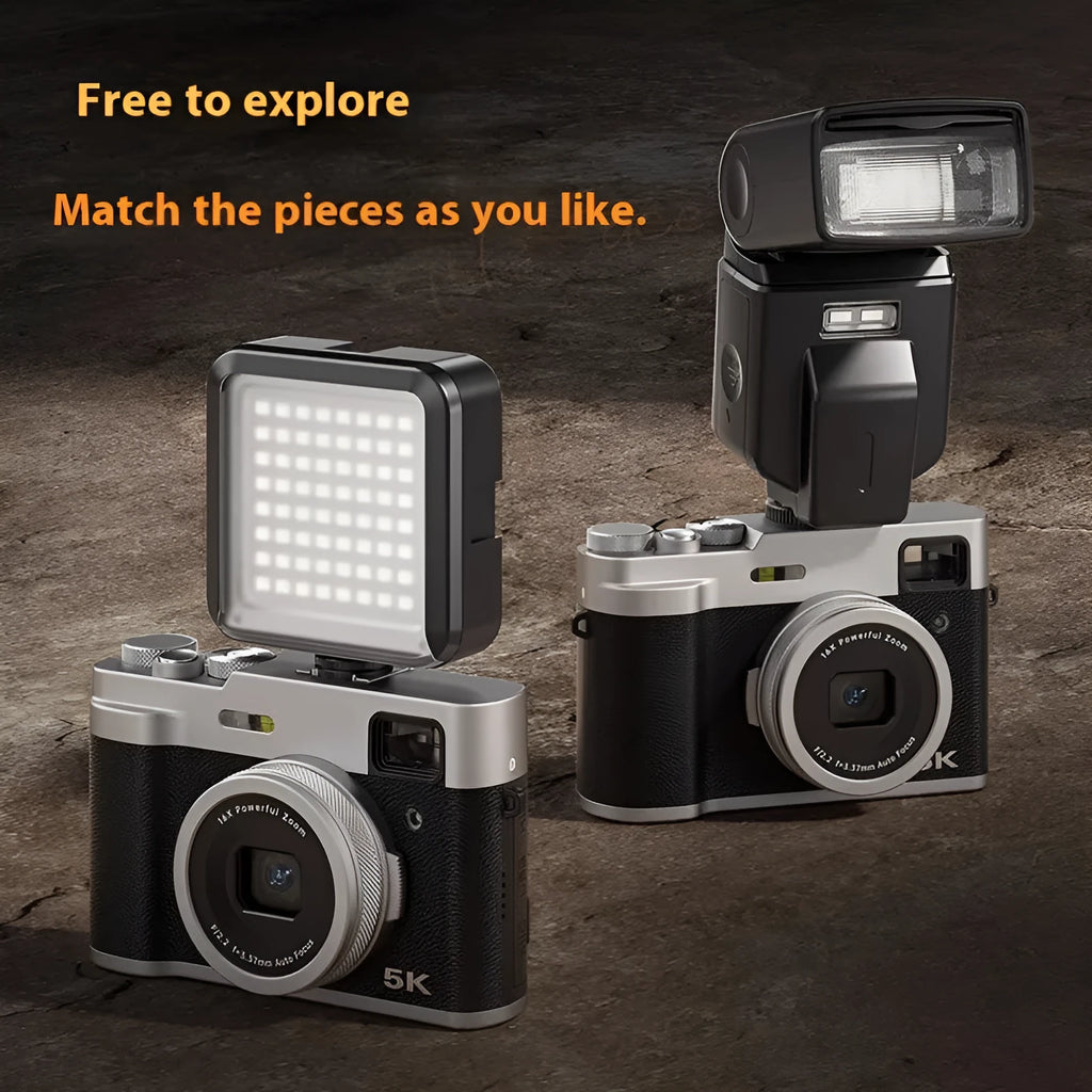 Black 5K HD digital camera with dual lenses, a 2.88-inch screen, and optical viewfinder on top.