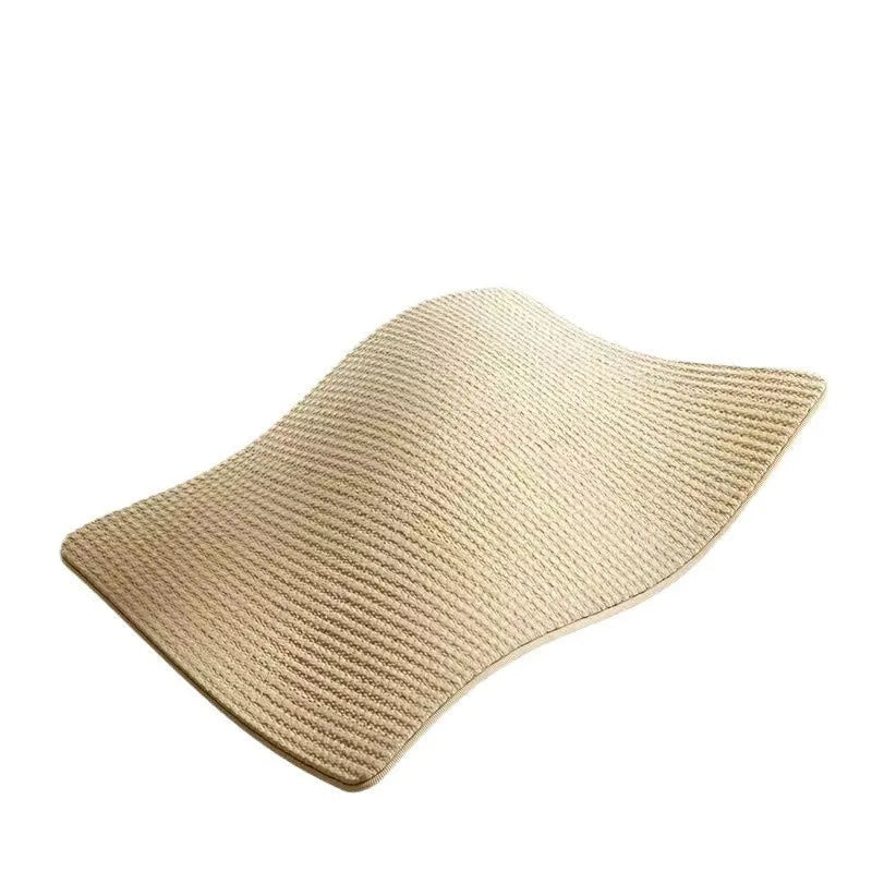 Beige sisal cat scratch board on a wooden floor.