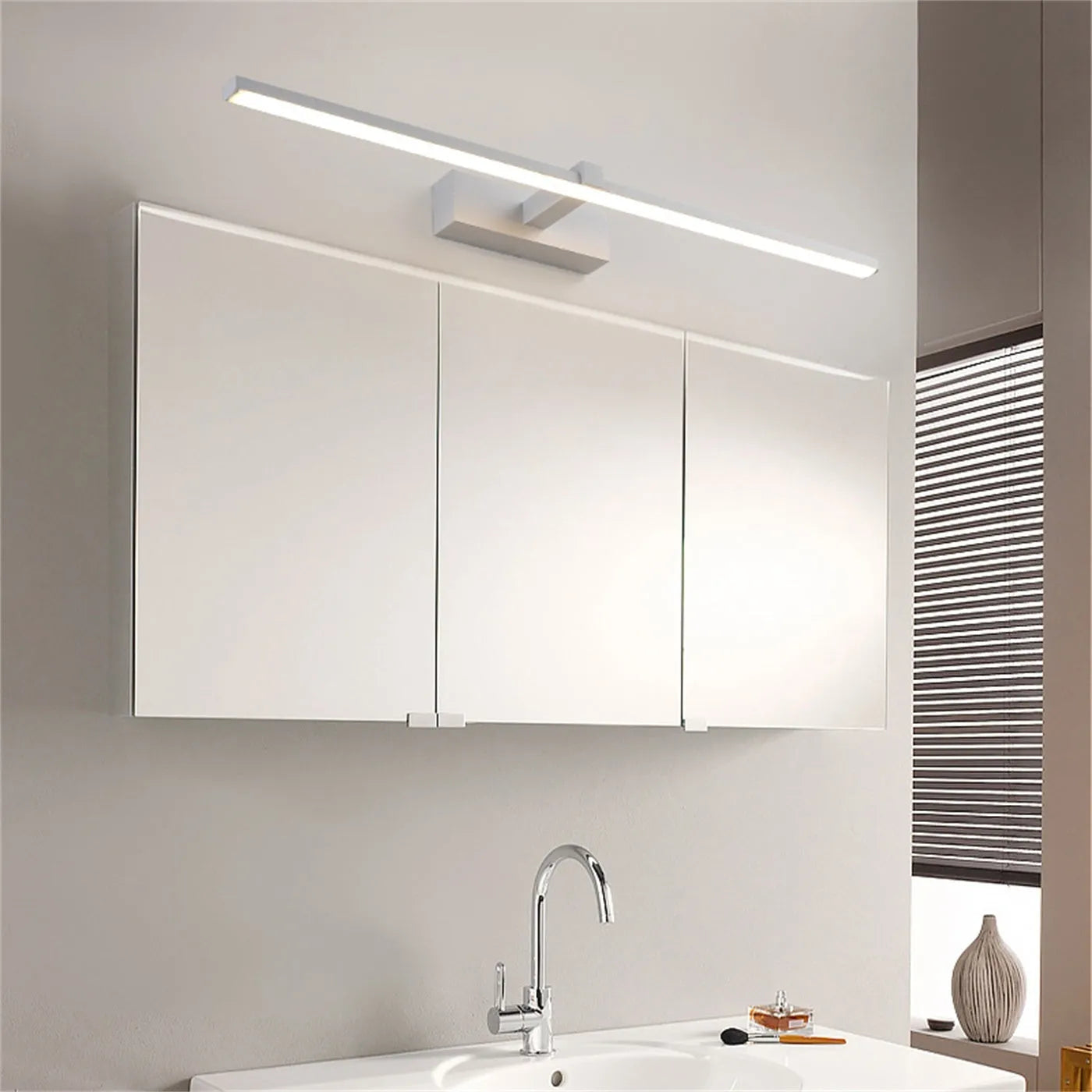 Black 40x8cm LED bathroom wall makeup lamp with warm light above a mirror