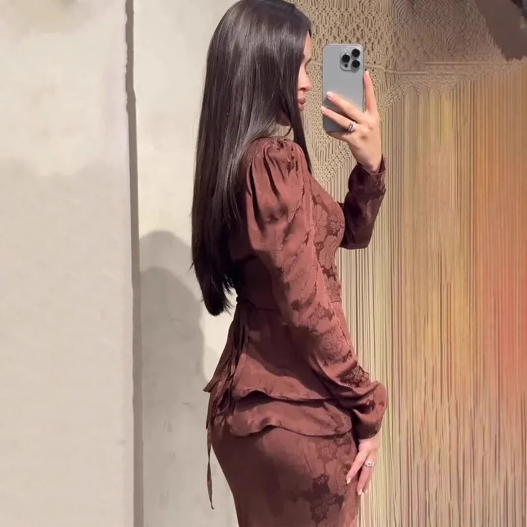 Dark brown women's retro style long sleeve dress with floral pattern and faux two-piece design.