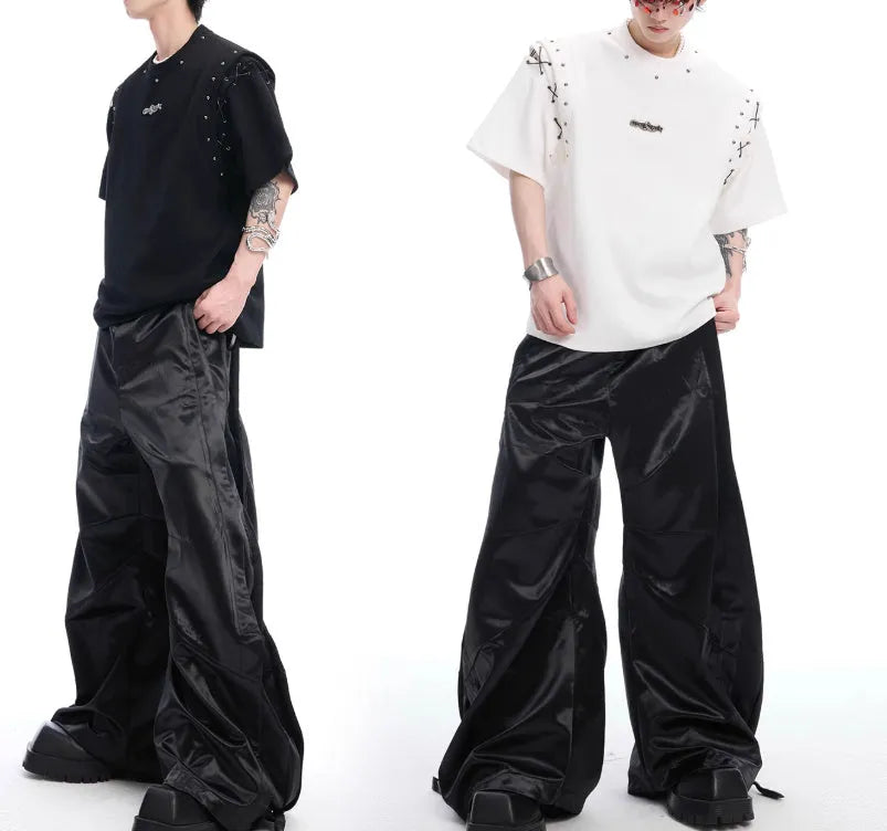 Black short sleeve cotton blend T-shirt with a lace-up cutout design detail on the front.