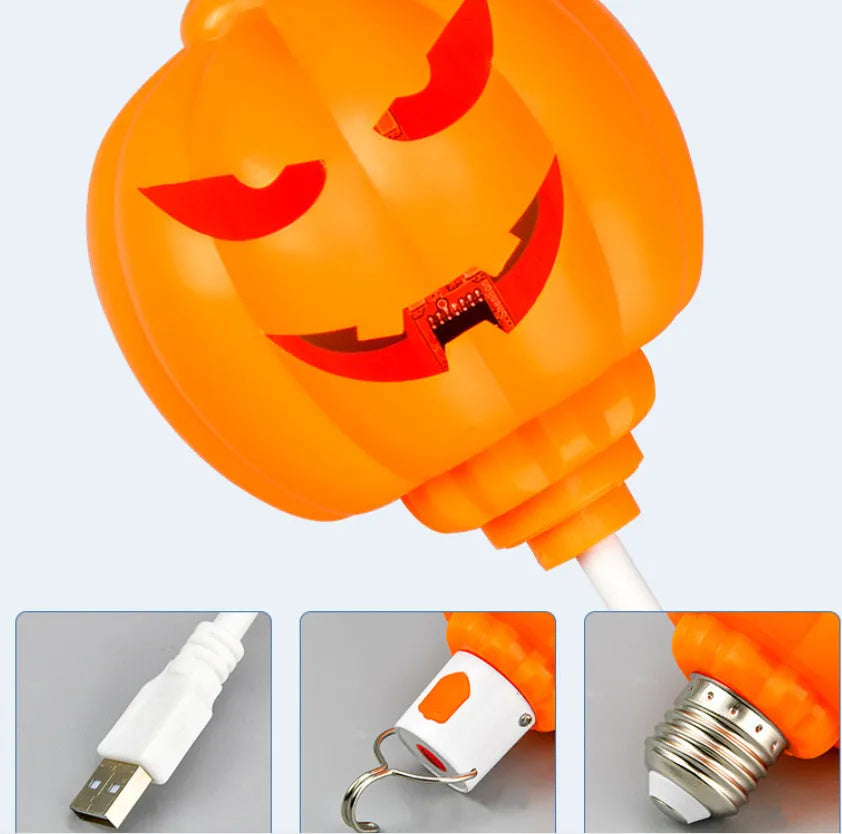 Plastic pumpkin lamp with USB cable, purple or yellow light option, 8.3cm wide by 22cm tall