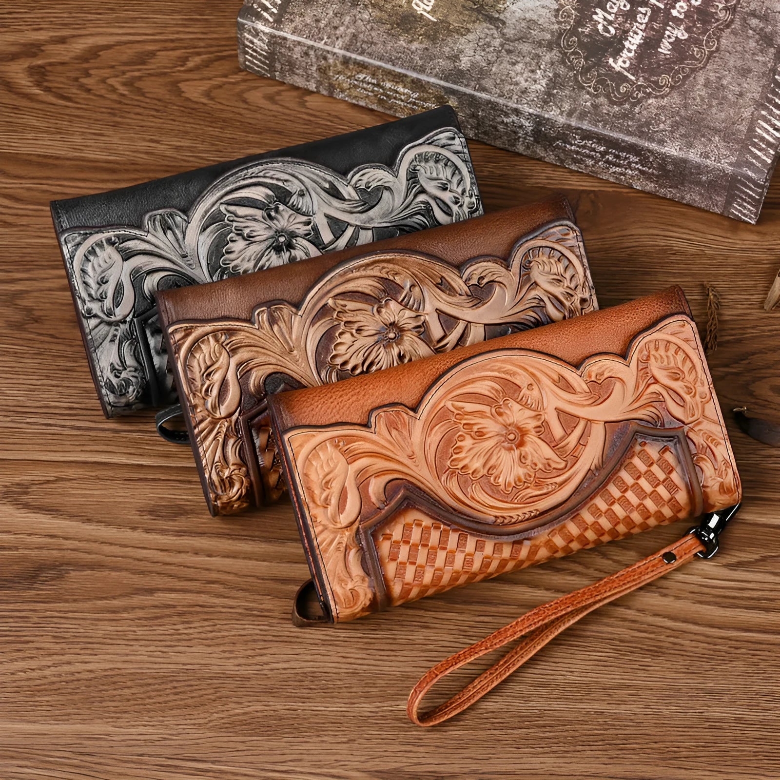 Brown genuine leather tri-fold wallet with embossed floral pattern showing interior compartments