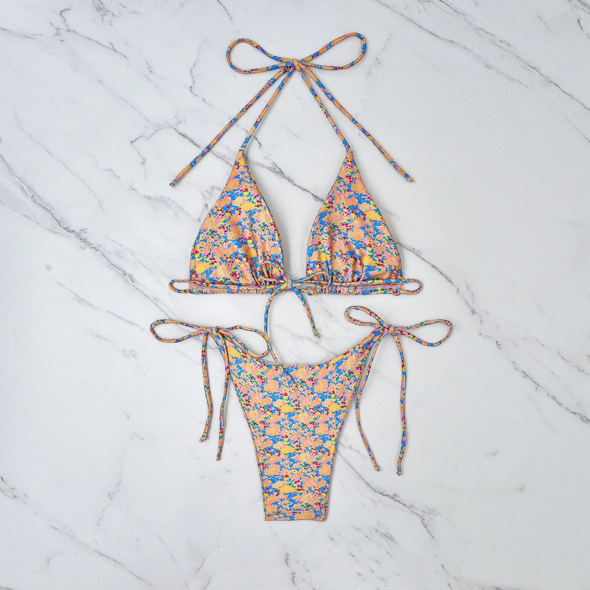 Women's lace-up front triangle bikini top and split high-cut briefs swimsuit set