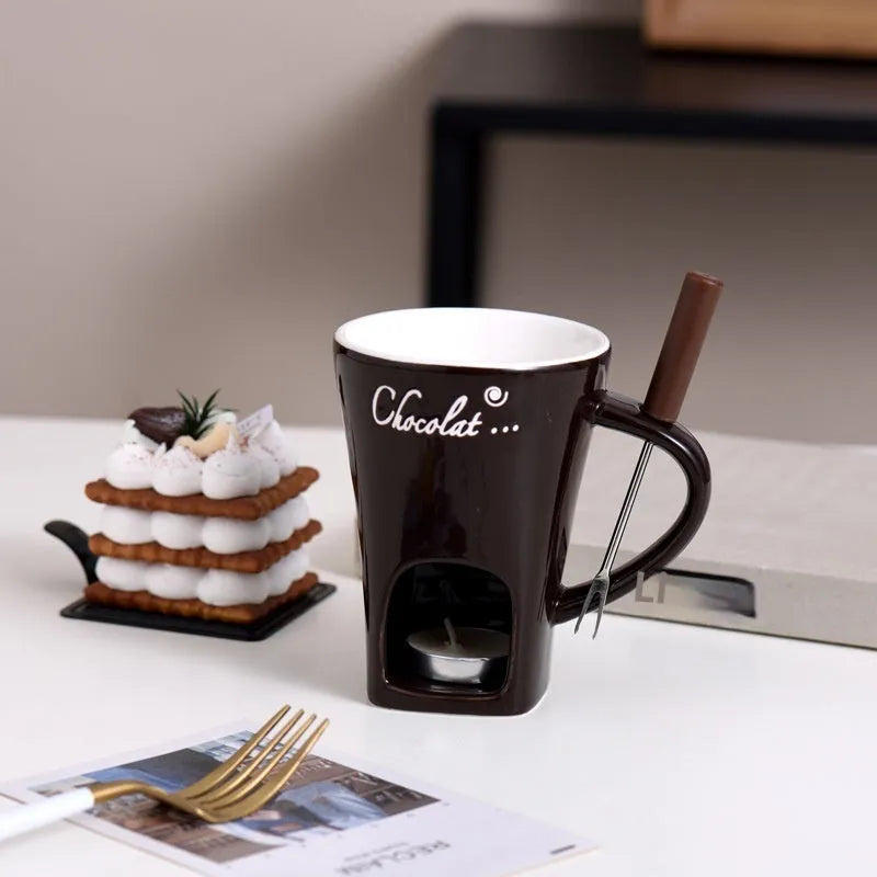Ceramic binaural hot pot cup in brown for melting chocolate with fork and candle beside it